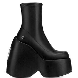 Naked Wolfe, Black Mayhem Stretch platform boots. Size 6.